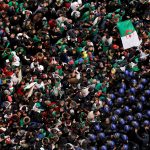 22 March 2019: Police officers attempt to disperse demonstrators trying to force their way to the presidential palace in Algiers during a protest calling for Abdelaziz Bouteflika to quit. (Photograph by Reuters/Zohra Bensemra)