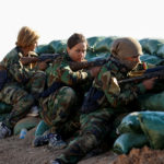 3 November 2016: Iranian-Kurdish female fighters take position during a battle with the Islamic State in Bashiqa, near Mosul, Iraq. (Photograph by Ahmed Jadallah/Reuters)