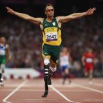 8 September 2012: Just five months before killing Reeva Steenkamp, Oscar Pistorius celebrates as he wins gold in the Men’s 400m T44 Final at the London 2012 Paralympic Games in London. (Photograph by Michael Steele/Getty Images)