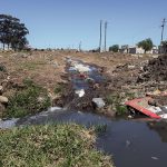15 October 2019: Human sewage flows freely through the streets of Joza township in Makhanda. (Photograph by Anna Majavu).