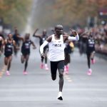 12 October 2019: Kenya’s Eliud Kipchoge, the marathon world recordholder, celebrates as he successfully completes his attempt to run a marathon in under two hours in Vienna, Austria. (Photograph by Lisi Niesner/Reuters)