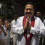 11 November 2018: Sri Lanka's vember 2019: Acting Prime Minister Mahinda Rajapaksa leaves a temple near his home in Colombo, Sri Lanka as political turmoil in the country deepens. (Photograph by Paula Bronstein/Getty Images)