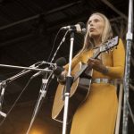 29 August 1970: Singer-songwriter Joni Mitchell performing at the Isle of Wight Festival. (Photograph by Tony Russell/Redferns)